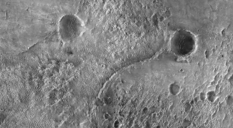 red rocky Martian surface stretching to the horizon